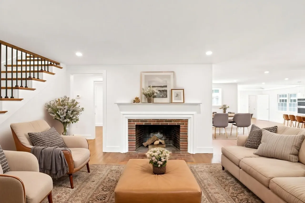A living room with a fireplace.